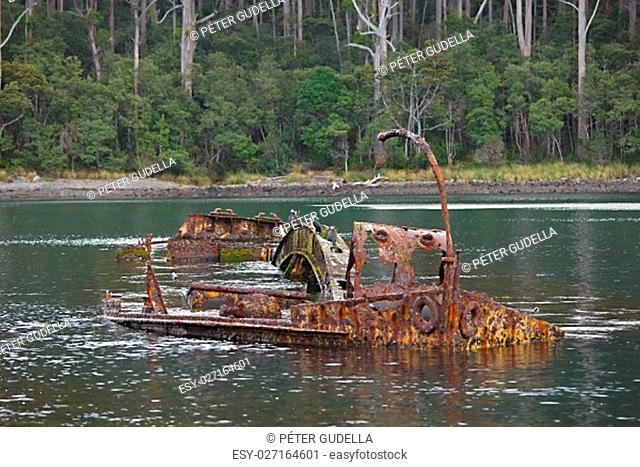Old rusty shipwreck in Canoe Bay, Tasmania, Tasman Peninsula