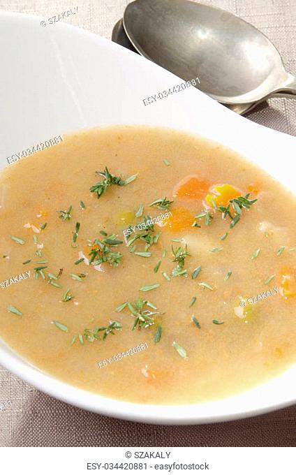 scotch broth soup with carrots and fresh thyme
