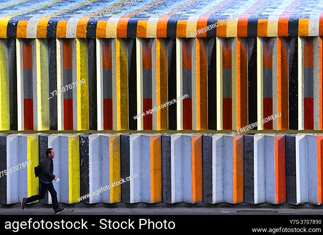 Wall of fountain covered in mosaic tiles by Israeli artist Yaacov Agam, in the La Defense area in Paris, France