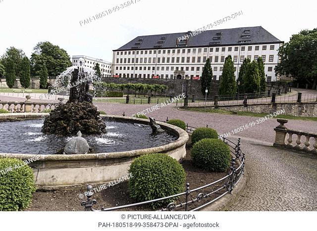 17 May 2018, Germany, Gotha: A fountain in front of Friedenstein Palace. Friedenstein Palace is one of the best preserved architectural monuments from early...