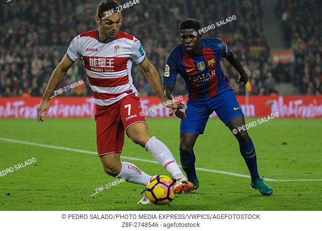 Barral and Umtiti during the match. FC Barcelona defeated Granada 1-0 with goal scored by Rafinha at the 47th minute. Liga Santander Season 2016-2017 game day...