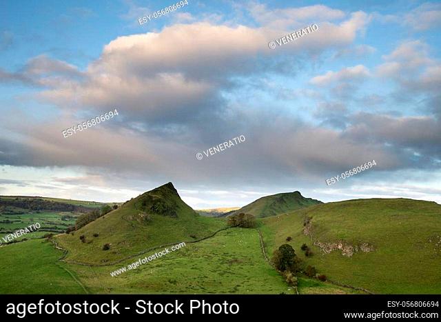 Beautiful landscape image of Peak District countryside at sunrise on Autumn Fall morning