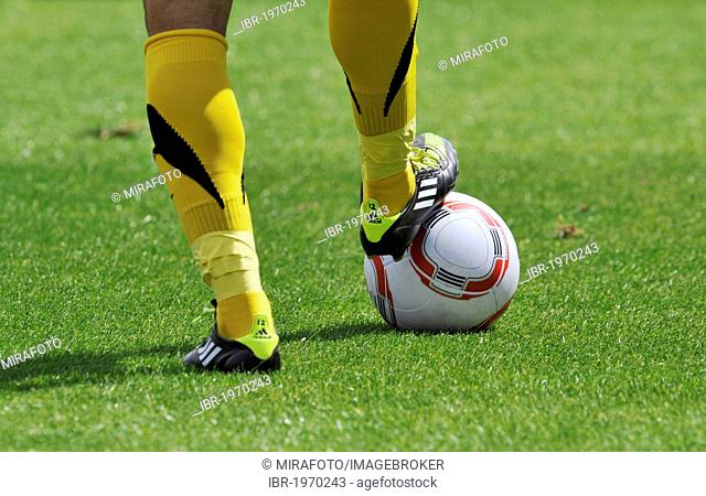 Legs of an Alemannia Aachen player playing the ball, during match versus Fortuna Duesseldorf, 2nd Bundesliga, Airberlin World, Duesseldorf