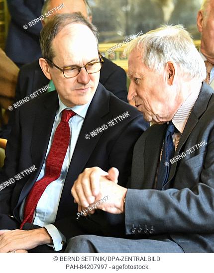 Prince Pueckler speaks with British Ambassador Sebastian Wood (R) on the occaisson of the permanent loan of the four-volume edition of 'Letters of a Dead...