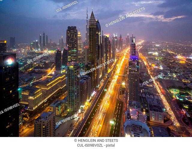 Skyscrapers along Sheikh Zayed Road at evening rush hour, Dubai, UAE