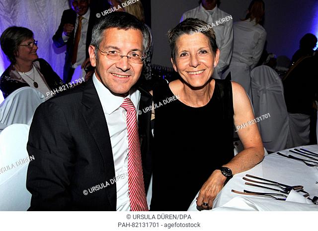 Herbert Hainer, CEO of Adidas AG (l) and his wife Angelika enjoying the gala that is being held as part of the 29th Kaiser Cup golf tournament