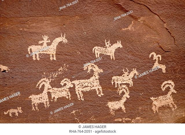 Bighorn hunt petroglyph panel, Arches National Park, Utah, United States of America, North America