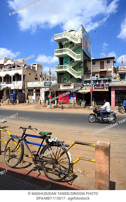 Bicycle in Bazaar Street ; District Kanchipuram ; Tamil Nadu; India