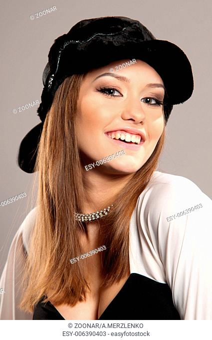 woman in a black hat