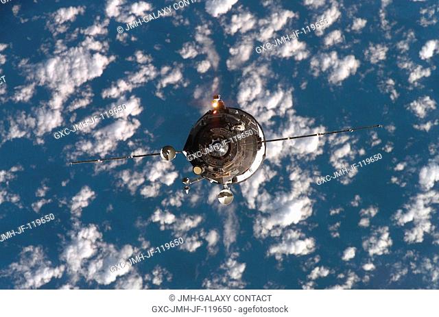 Backdropped by a blue and white Earth, an unpiloted Progress supply vehicle approaches the International Space Station. The Progress 24 resupply craft launched...