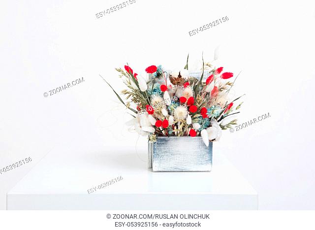 BeauBouquet of dried flowers on a white