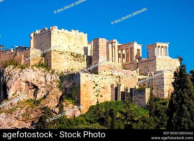 Athens, Attica / Greece - 2018/04/03: Panoramic view of Acropolis of Athens with Propylaea monumental gateway and Nike Athena temple seen from Aeropagus rock