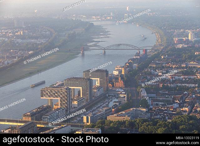 Kranhäuser and the River rhine in Cologne, Germany from a higher ground: captured 'on air' via Zeppelin in the early morning just after sunrise