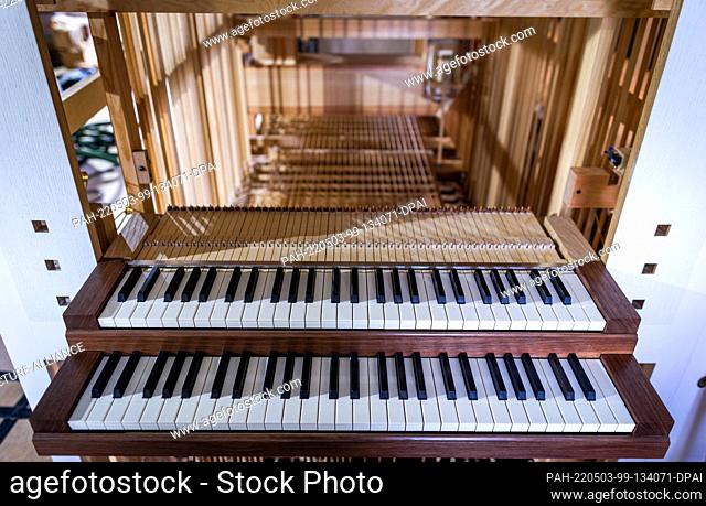 02 May 2022, Mecklenburg-Western Pomerania, Pinnow: The keyboard of the new organ for the village church from the 14th century
