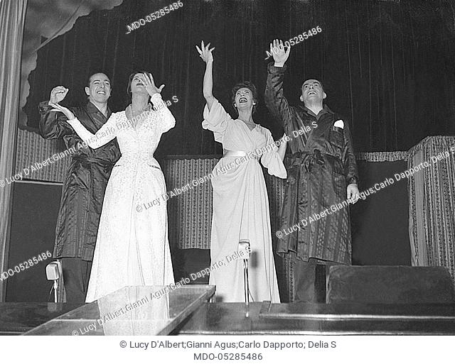 Italian showgirl Delia Scala (Odette Bedogni), Soviet actress Lucy D'Albert (Elena Lucy Johnson) and Italian actors Gianni Agus and Carlo Dapporto greeting at...