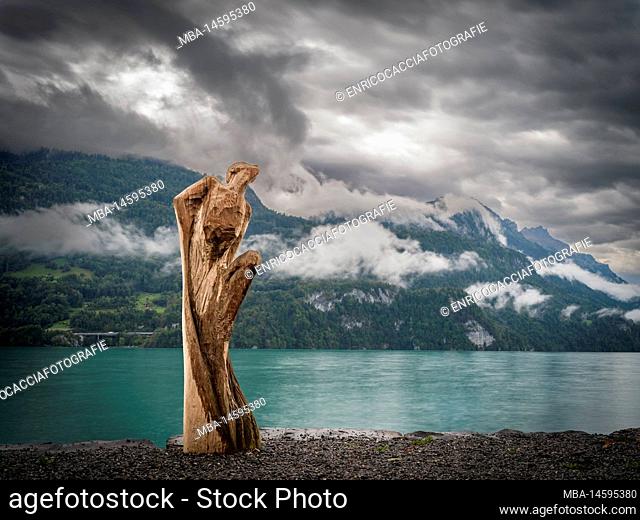 Wooden statue on the lake Brienz