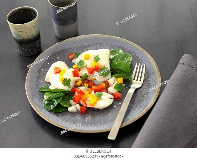Pollock with red and yellow diced peppers and baby spinach