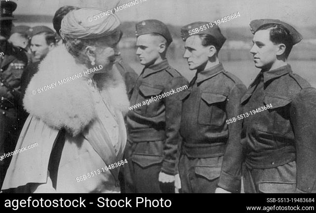 Queen Mary inspecting militiamen, already wearing their new battle dress, at *****. ***** Royal armoured corps (13th/18th Hussars) arrived there to begin their...