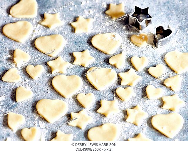 Heart and star shapes cookies with cookie cutters