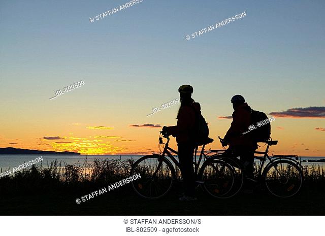A younger couple on biking tour , Ängelholm, Skåne, Sweden