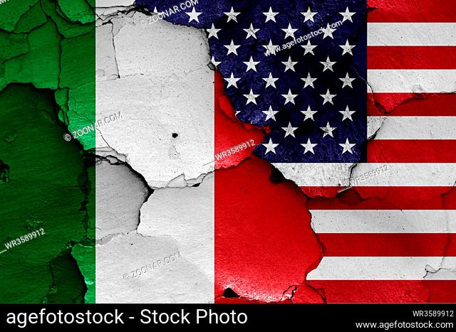 flags of Italy and USA painted on cracked wall