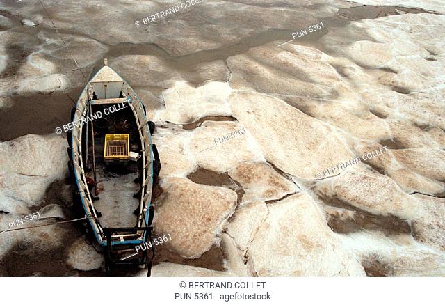 Small boat embedded in ice Charentes maritimes