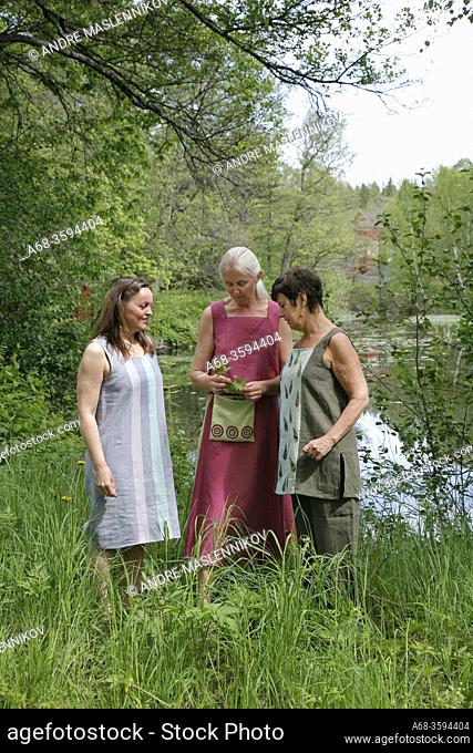 Middle-aged women with clothes they sewed themselves. Model released. Sweden. Photo: André Maslennikov