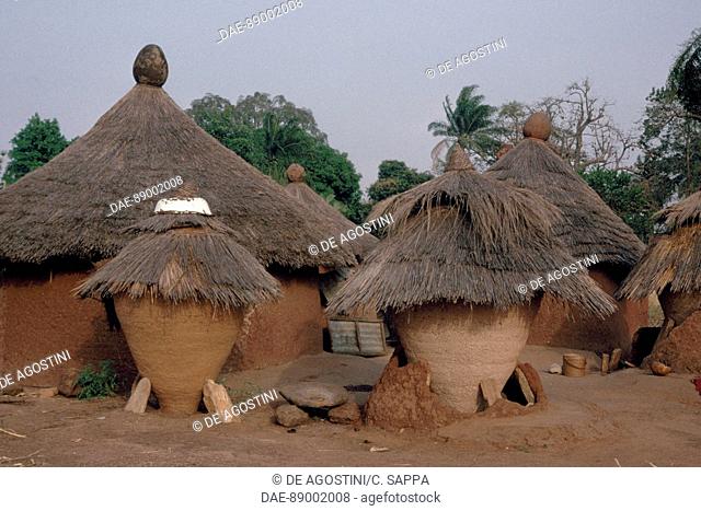 Tata, fortress house, and circular huts in a village, Togo