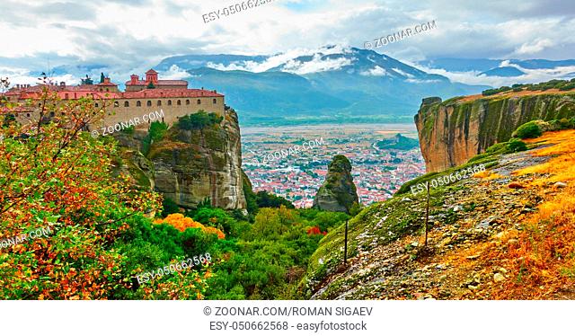 View of St. Stephen monastery on the top of rock in Meteora in the autumn, Greece