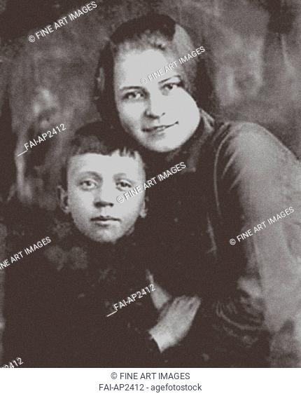 Alexandra Yesenina with the Yesenin's Son Yuri Izryadnov. Anonymous . Photograph. Early 1920s. Russia. Private Collection. Portrait