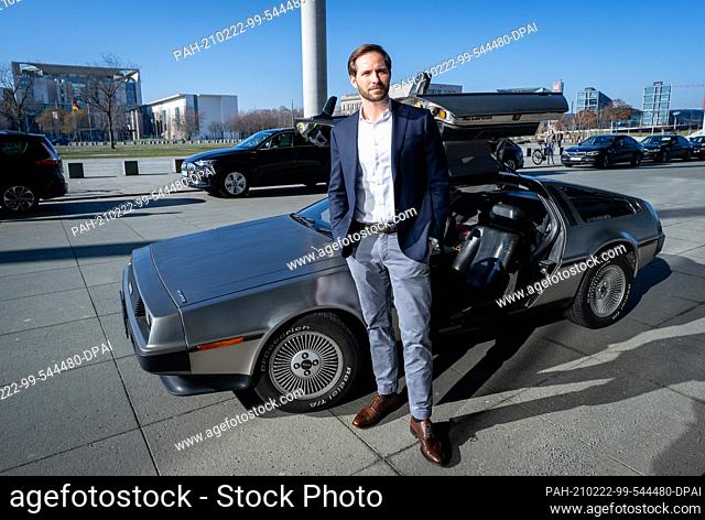22 February 2021, Berlin: Christoph Weigler, Germany head of Uber, gets out of the ""Back to the Future"" DeLorean in front of the Paul Löbe House
