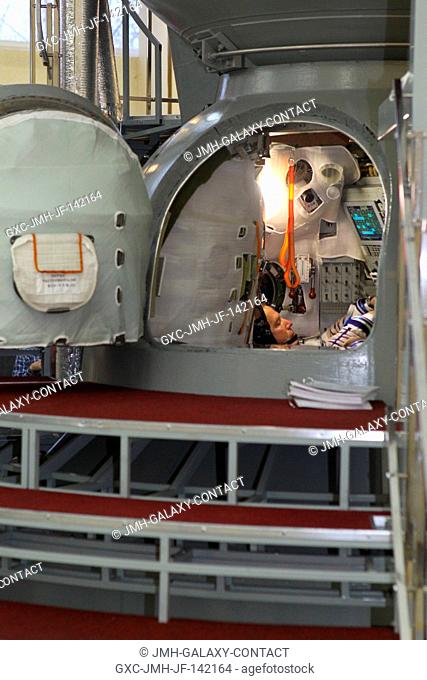 At the Gagarin Cosmonaut Training Center in Star City, Russia, Expedition 46-47 crewmember Tim Kopra of NASA reviews procedures inside a Soyuz spacecraft...