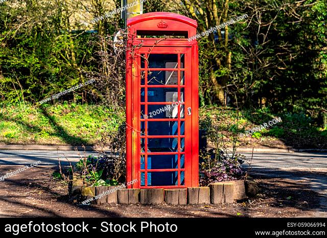 A derelict telephone booth, seen near Flixton, Suffolk, England, UK