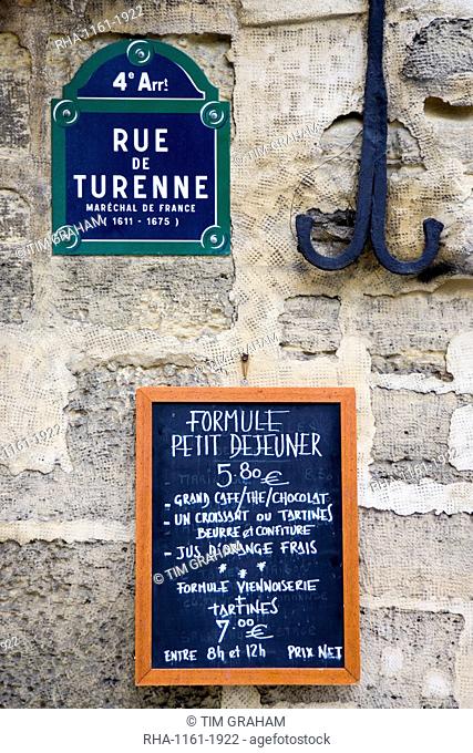 Street sign and Petit Dejeuner brasserie board, rue de Turenne, 4th arondissement, Paris, France