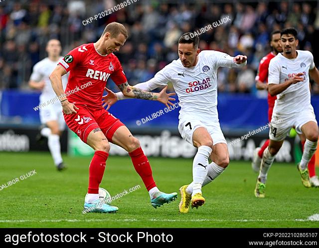 Ondrej Duda of Cologne, left, and Daniel Holzer of Slovacko in action during the Group D, 5th round soccer match of the European Conference League 1