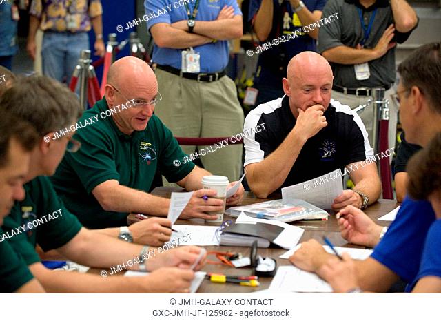NASA astronauts Scott Kelly (left), Expedition 25 flight engineer and Expedition 26 commander; and Mark Kelly, STS-134 commander