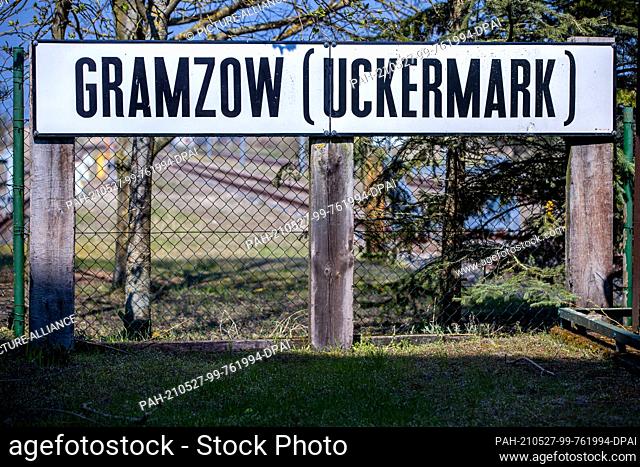 28 April 2021, Mecklenburg-Western Pomerania, Pasewalk: The place-name sign ""Gramzow (Uckermark) stands in the railway experience centre Lokschuppen Pomerania