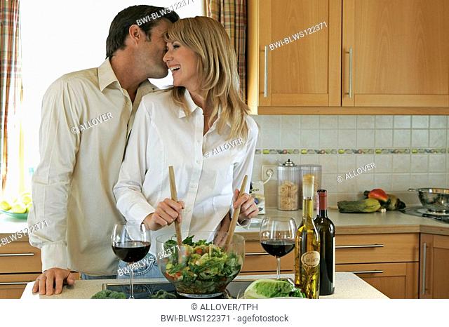couple working in the kitchen