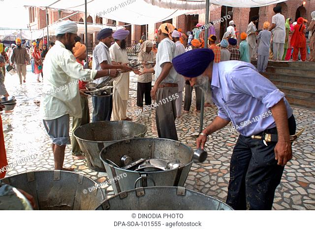 Langar ; community kitchen ; free food-guru ka langar ; the guru's kitchen introduced by guru Amar Das to melt the caste barriers and to provide free food for...