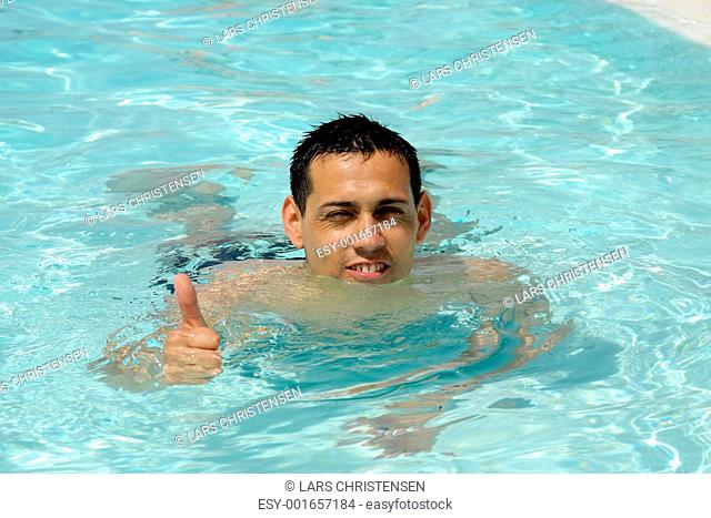 Happy man in pool