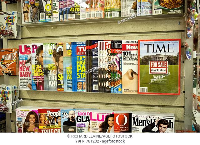 A collection of various magazines on sale are seen in a supermarket in New York Magazine sales in the United States fell almost 10 percent during the first half...