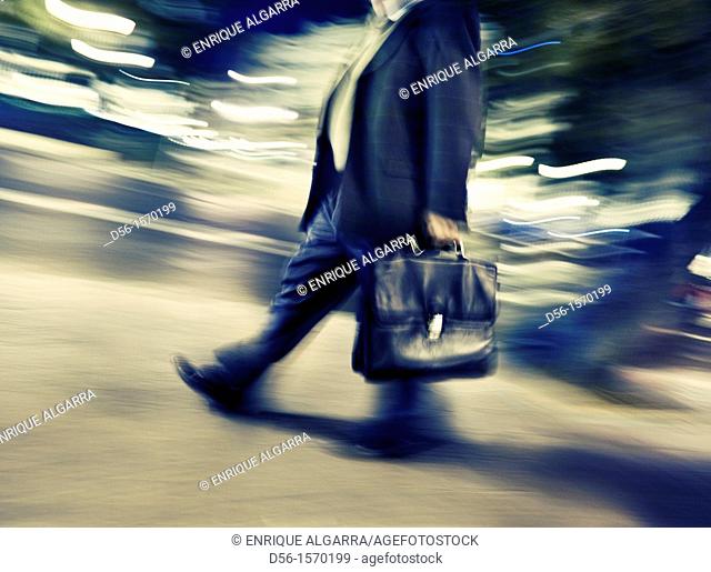 man walking with briefcase