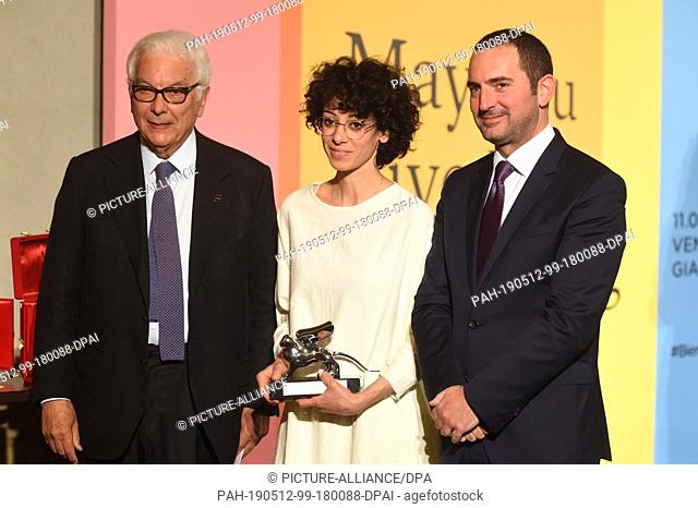 11 May 2019, Italy, Venedig: Paolo Baratta, president of the Art Biennale and the artist Haris Epaminonda with her silver lion will be on stage for the Golden...