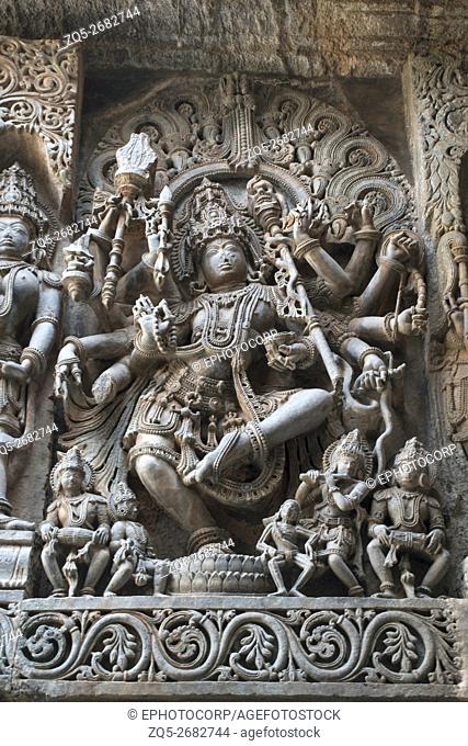 Sculpture of dancing Shiva, Hoysaleshwara temple, Halebidu, Karnataka, india. view from West