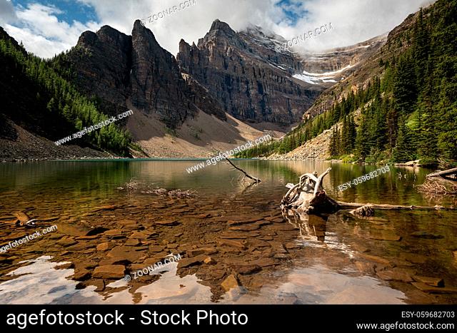 Panoramic image of Lake Agnes, a quiet place surrounded by the Rocky Mountains close to Lake Louise, Banff National Park, Alberta, Canada