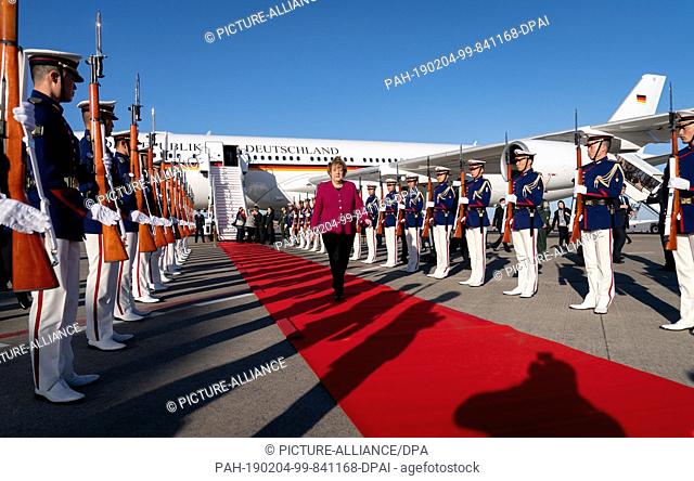 04 February 2019, Japan, Tokio: German Chancellor Angela Merkel (CDU), arriving at Haneda International Airport in Tokyo