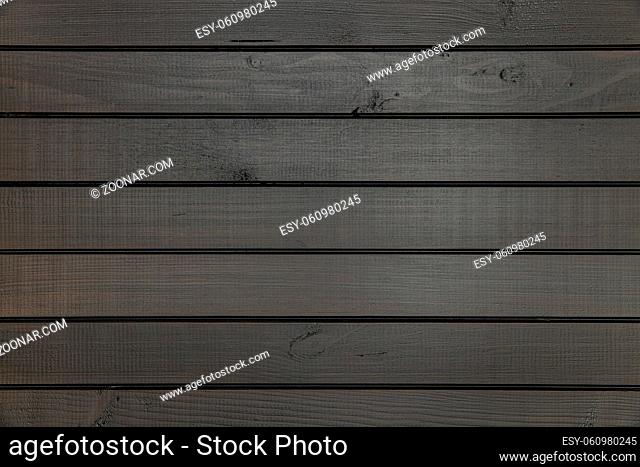 Black wooden plank background. Wooden wall
