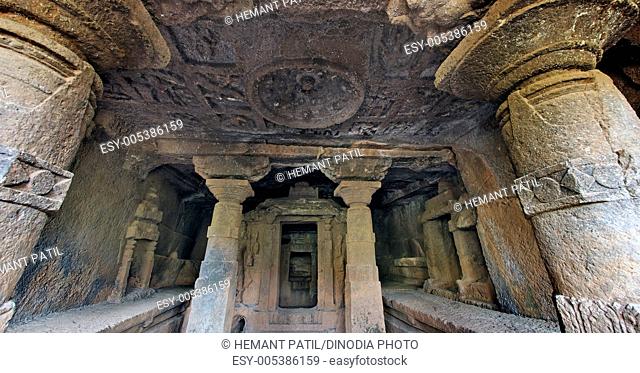 Inside view of sabha mandapa showing partial view of garbha griha of cave number nineteen in Panhale Kazi caves ; Konkan ; Maharashtra ; India