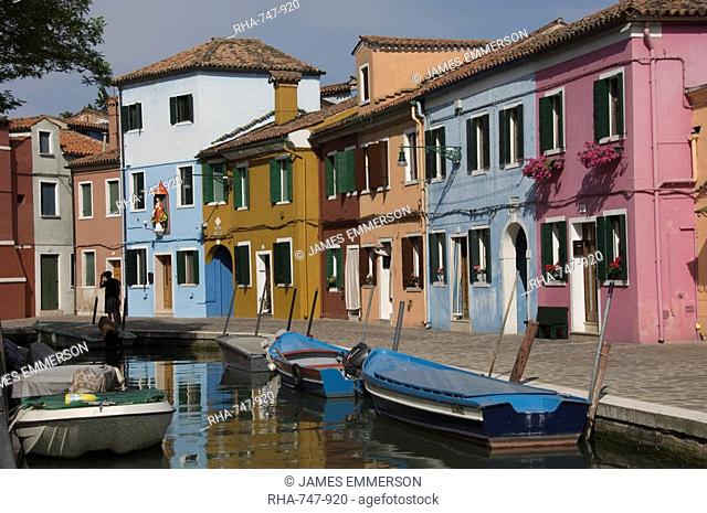 Pastel coloured houses by a canal in Burano, Venetian Lagoon, Venice, Veneto, Italy, Europe