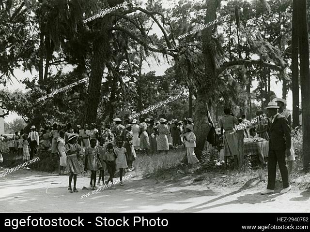 African Americans celebrating the Independence Day and picnicking in a park, June 1939. Creators: Farm Security Administration, Marion Post Wolcott